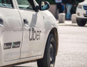 Read more about the article Uber Faces Share Decline Amidst Operating Profit Milestone